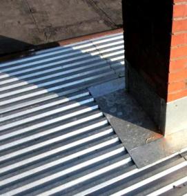 Гидроизоляция печной трубы на крыше из профнастила - модель 1