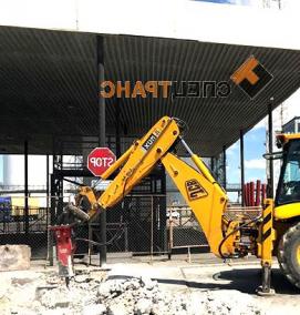 услуги экскаватора погрузчика с гидромолотом - модель 2